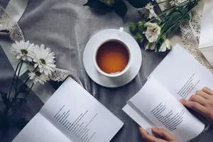 two books and a cup of tea