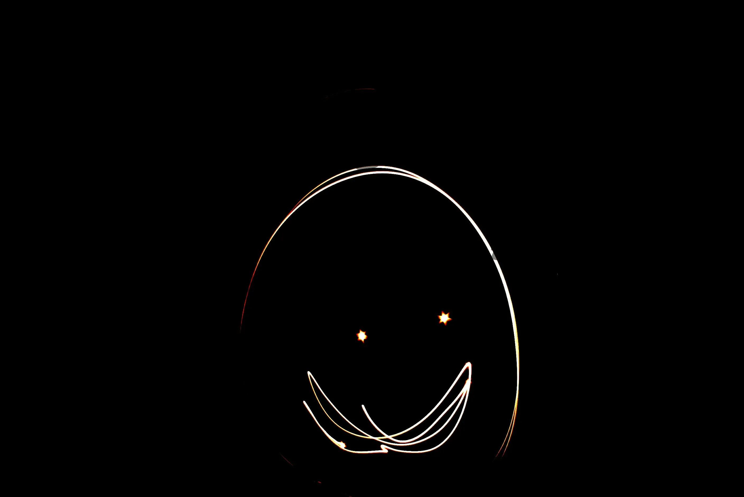 an egg-shaped drawing with a smile