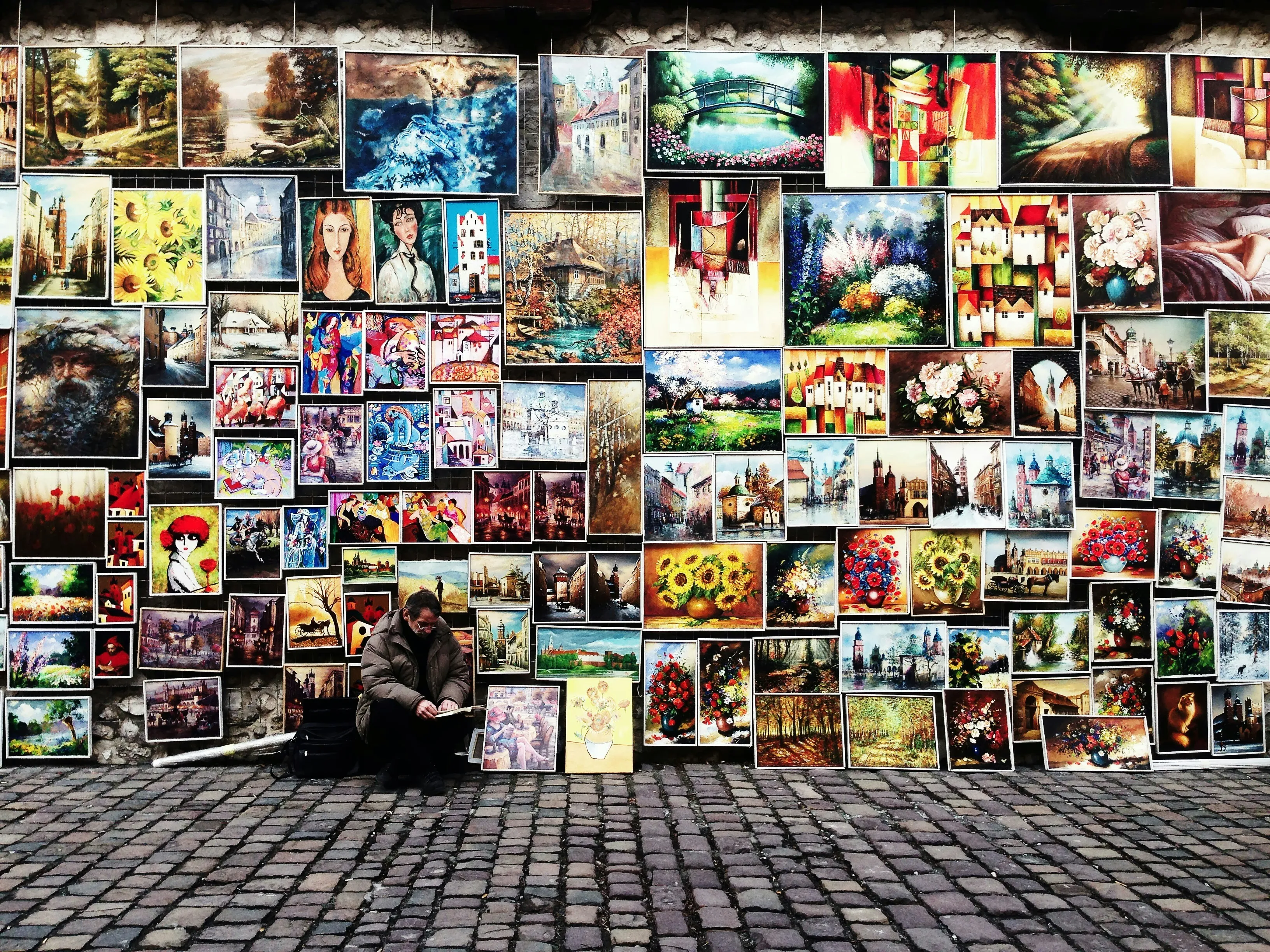 wall with pictures and photos